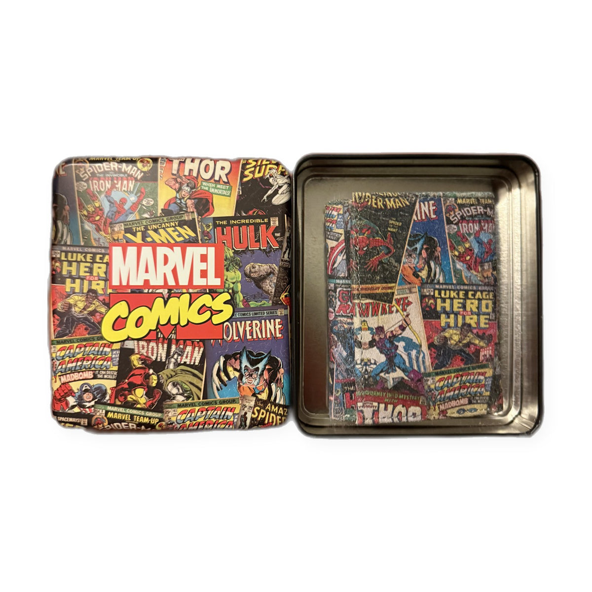 Marvel Comics trifold wallet — beside its collectible tin