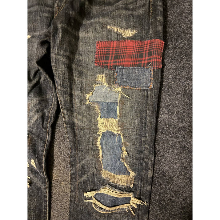 Polo Ralph Lauren patchwork repaired jeans — plaid patch detail