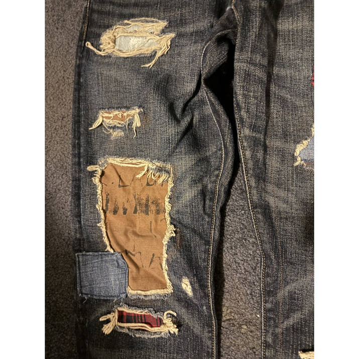 Polo Ralph Lauren patchwork repaired jeans — repair and distressing detail