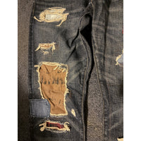 Polo Ralph Lauren patchwork repaired jeans — repair and distressing detail