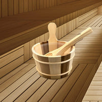 Wooden sauna bucket and ladle on the tiered benches of a wood-lined sauna